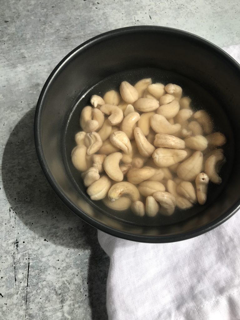 Soak cashews in water