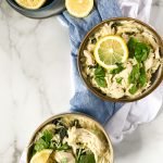 dairy free lemon orzo soup in 2 bowls