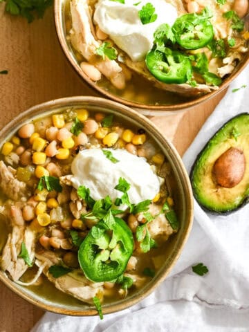 a healthy chicken chili with beans, jalapeño and cilantro