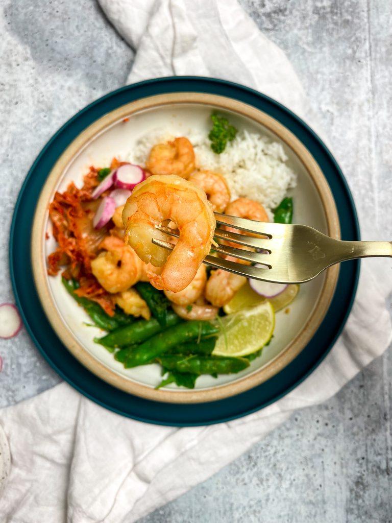 Healthy shrimp rice bowl up close to shrimp