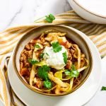cabbage soup in a bowl with greek yogurt