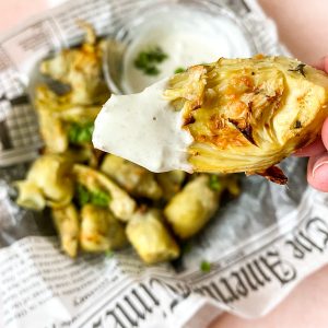 artichokes dipped in aioli