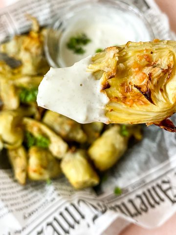 artichokes dipped in aioli