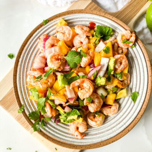 a bowl of mango shrimp salsa