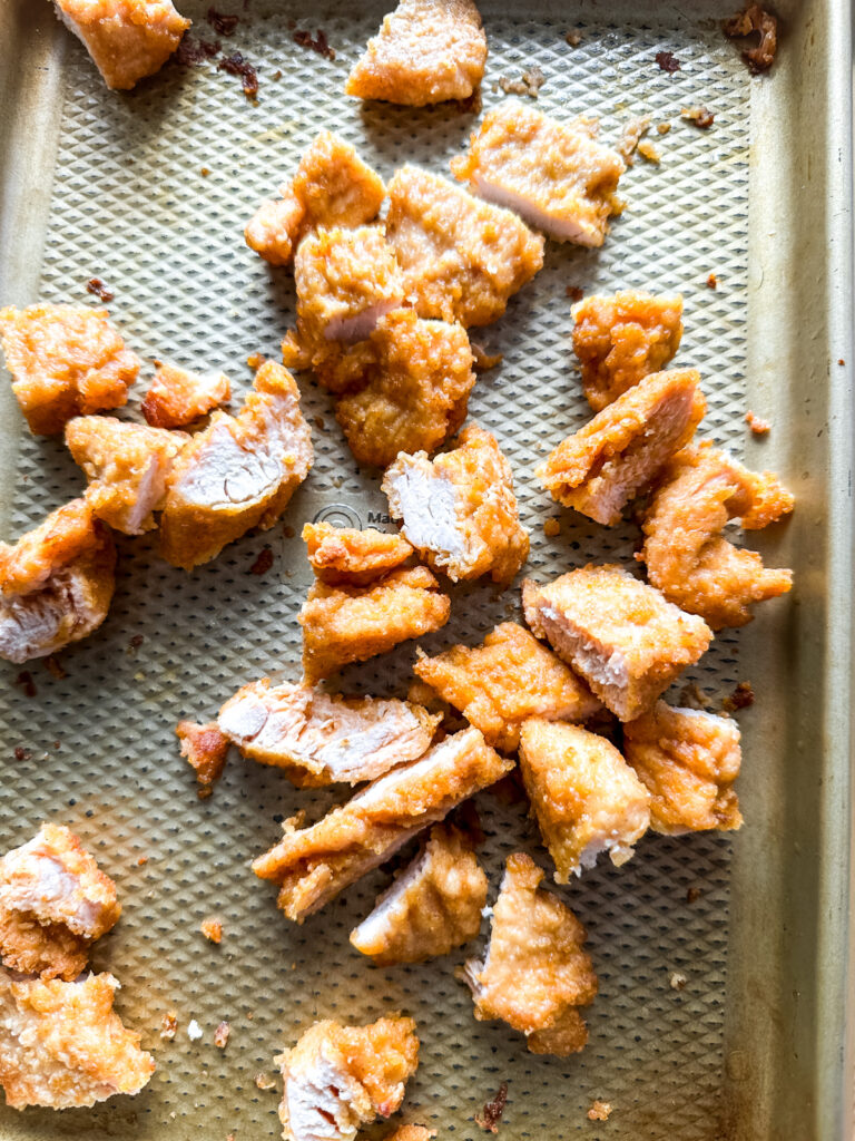 a sheet pan of fried chicken