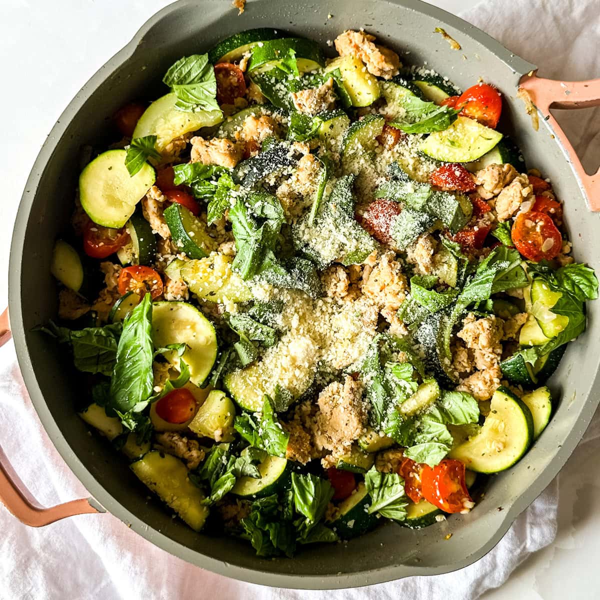 a pan of Italian style zucchini with chicken sausage