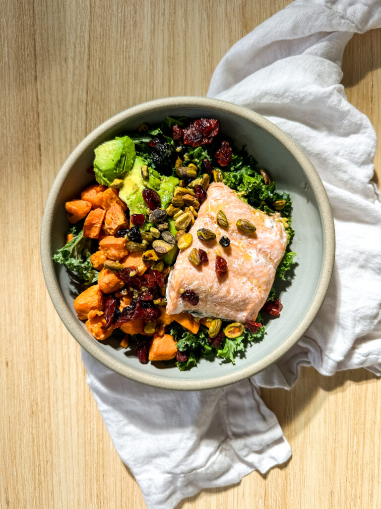 a salmon kale salad with sweet potatoes