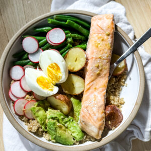 A salmon quinoa salad nicoise style