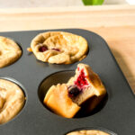 Easy Baked Protein Pancake muffins with a bite taken out
