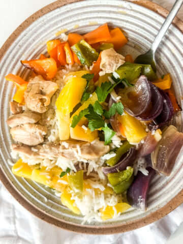 Hawaiian Sheetpan Chicken in a bowl with rice