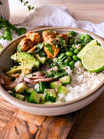 teriyaki chicken poke bowls with avocado and lime