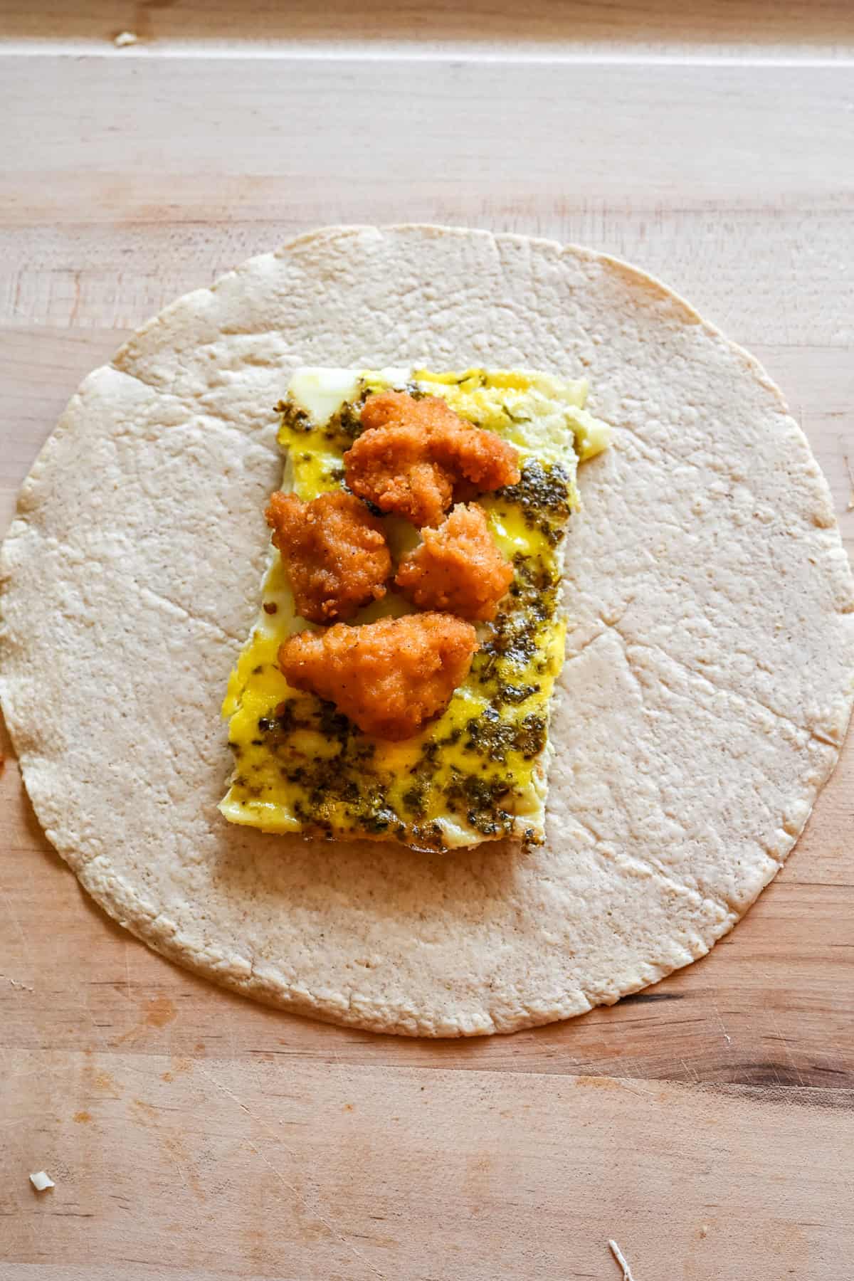 crispy chicken breakfast burritos before wrapping