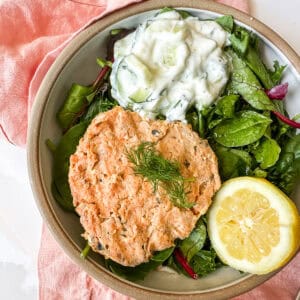 Easy Salmon Burgers (Freezer Friendly) in a bowl with lettuce