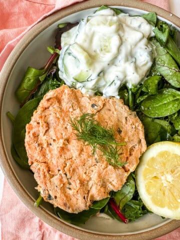 Easy Salmon Burgers (Freezer Friendly) in a bowl with lettuce